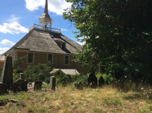 An older grouping of stones behind the Old Ship Church